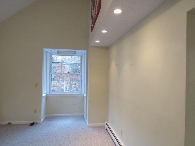 67 Deerfield Road Mashpee, MA 02649 - Photo 5 of 27 an empty room with windows