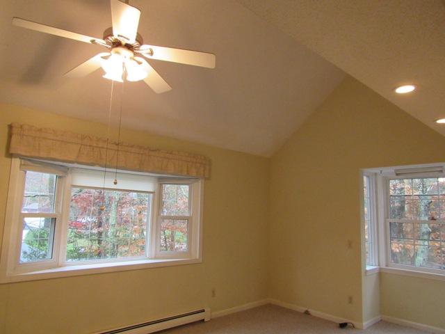67 Deerfield Road Mashpee, MA 02649 - Photo 6 of 27 a view of an empty room with a window