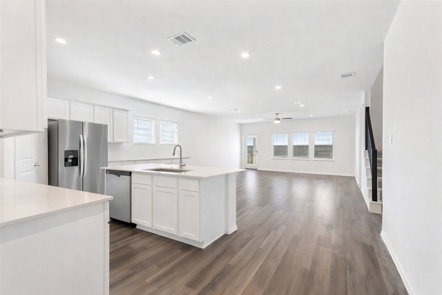 306 Springfield Shrs Court Crosby, TX 77532 - Photo 12 of 31 a kitchen with stainless steel appliances a refrigerator sink and cabinets