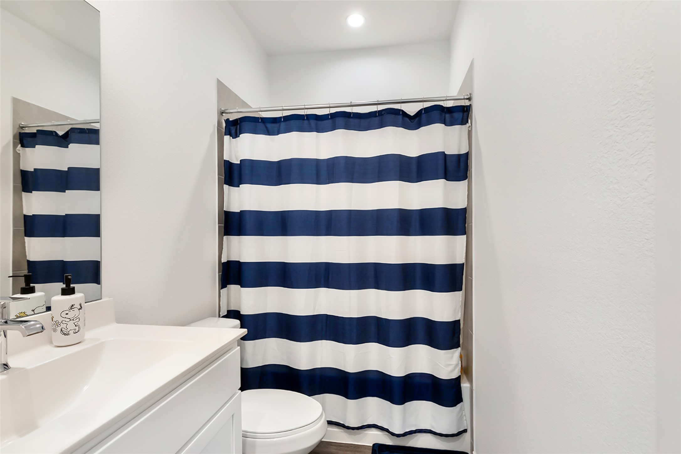 306 Springfield Shrs Court Crosby, TX 77532 - Photo 16 of 31 a bathroom with a sink a toilet a mirror and shower