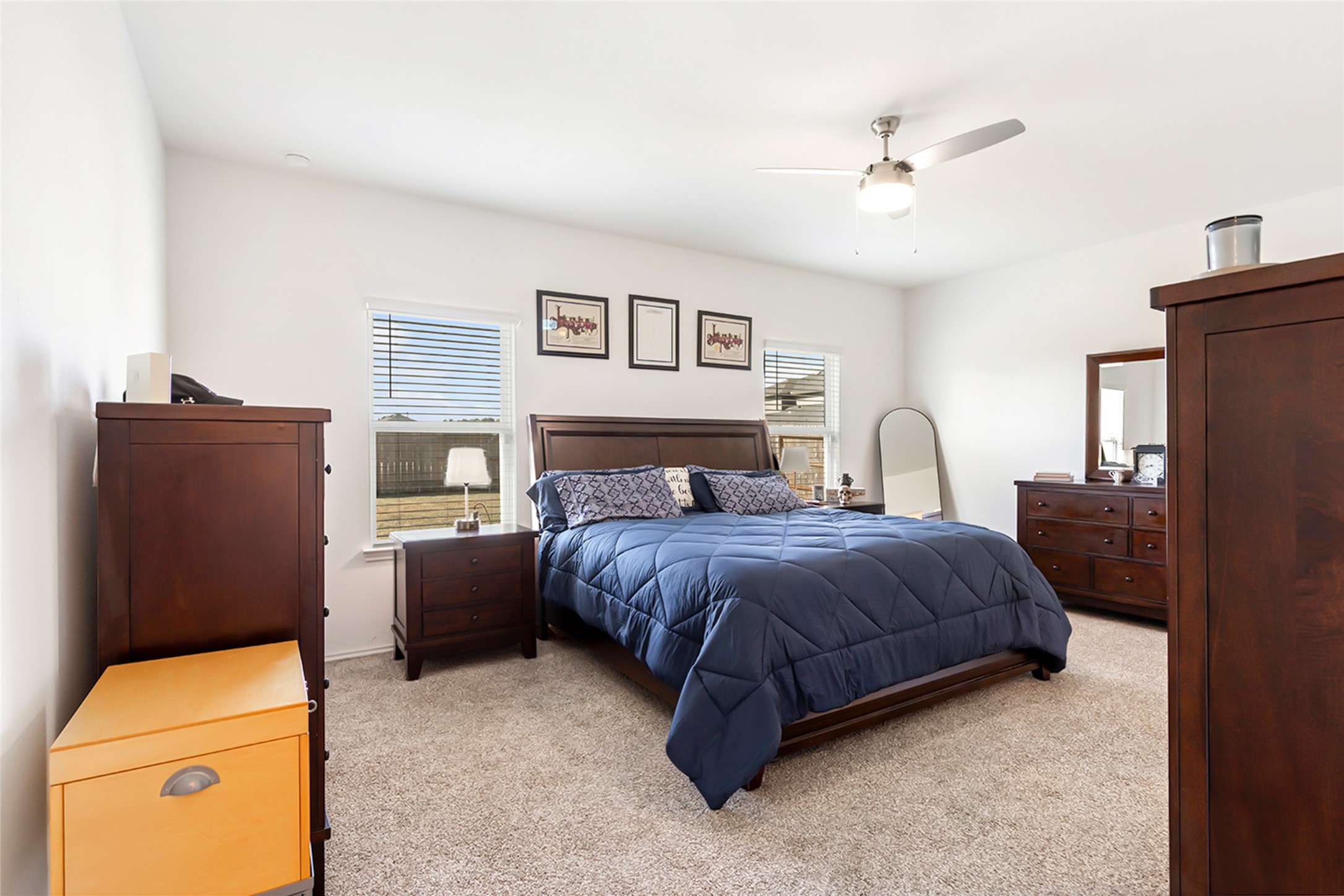 306 Springfield Shrs Court Crosby, TX 77532 - Photo 17 of 31 a bedroom with a bed and a chandelier