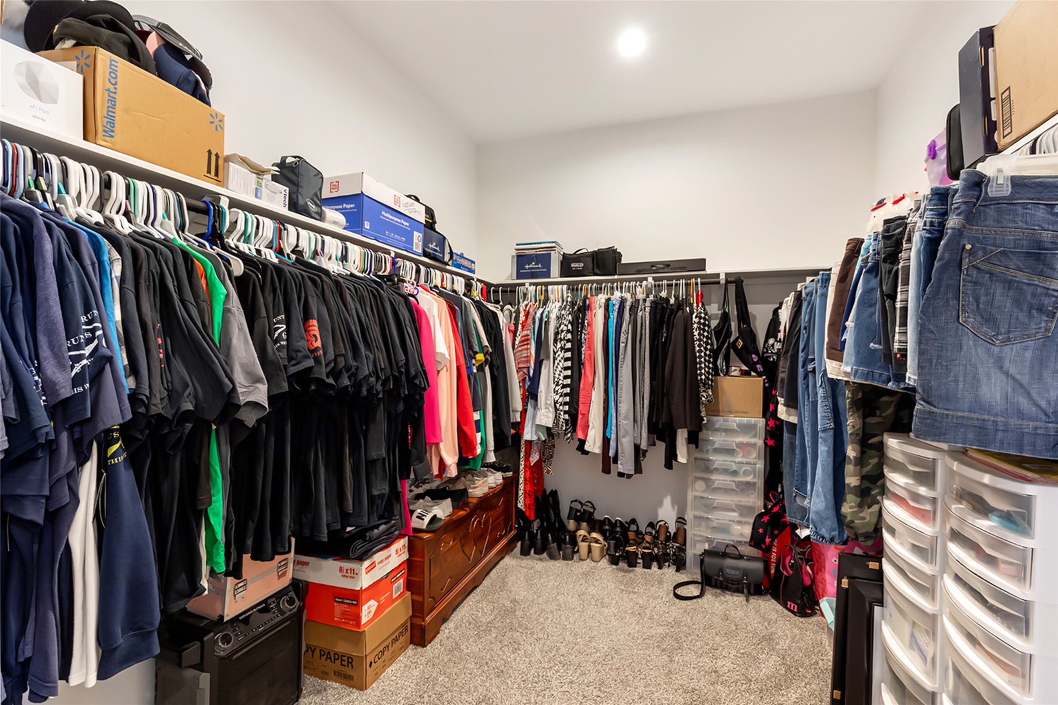 306 Springfield Shrs Court Crosby, TX 77532 - Photo 23 of 31 a view of walk in closet with clothes and shoes