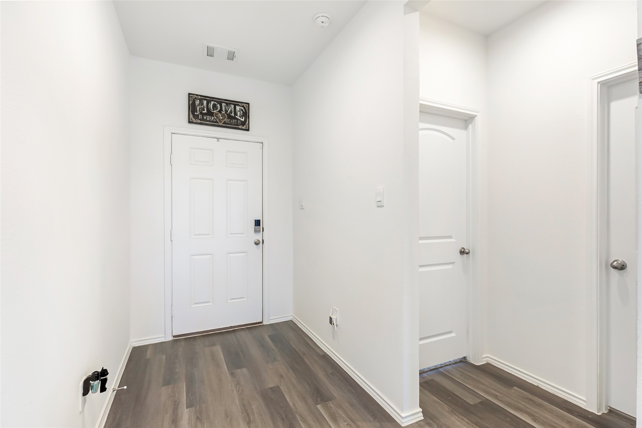 306 Springfield Shrs Court Crosby, TX 77532 - Photo 10 of 31 a view of a hallway with wooden floor