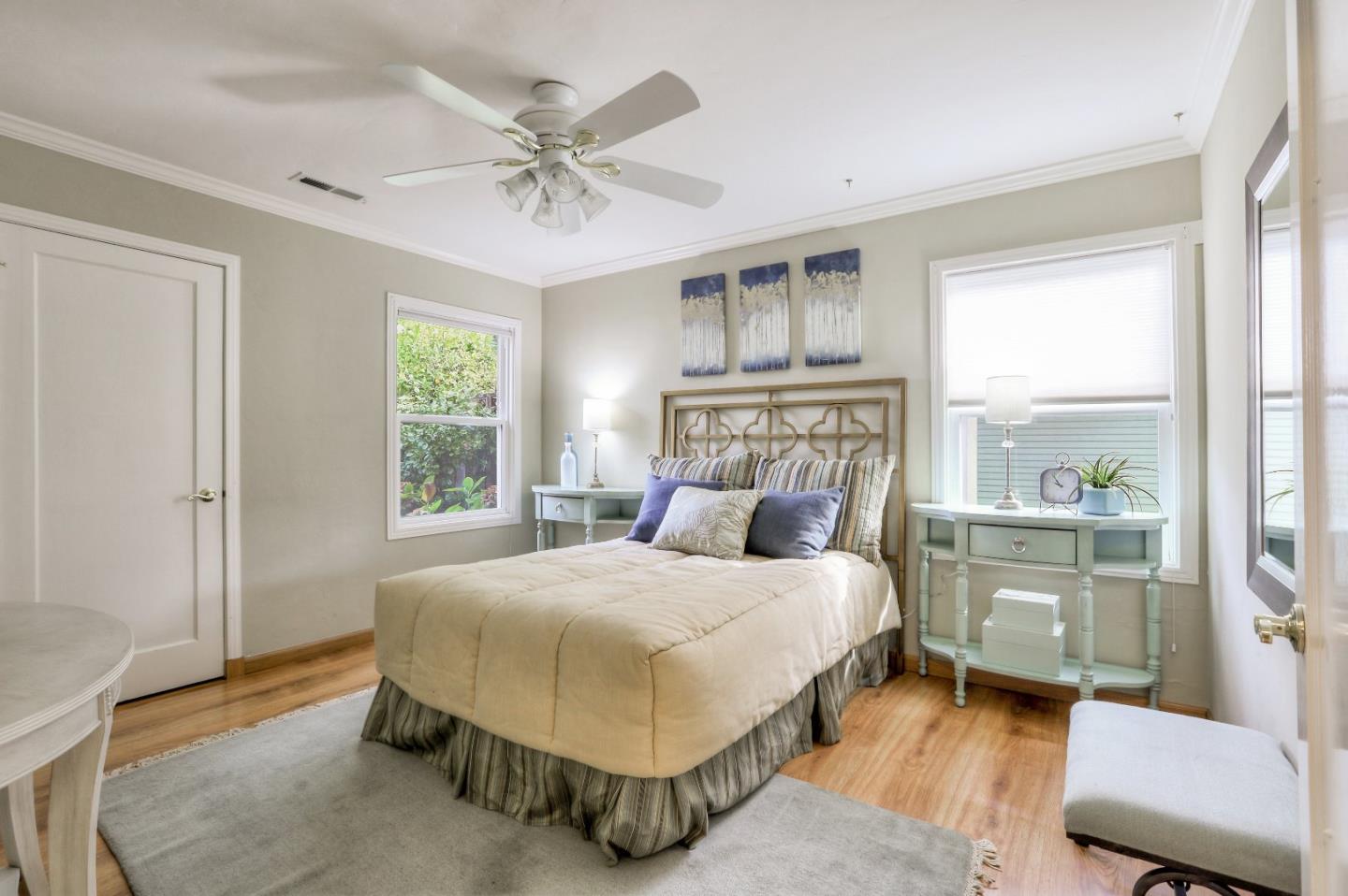 66 Church Street Mountain View, CA 94041 - Photo 19 of 45 a bedroom with a large bed and a window