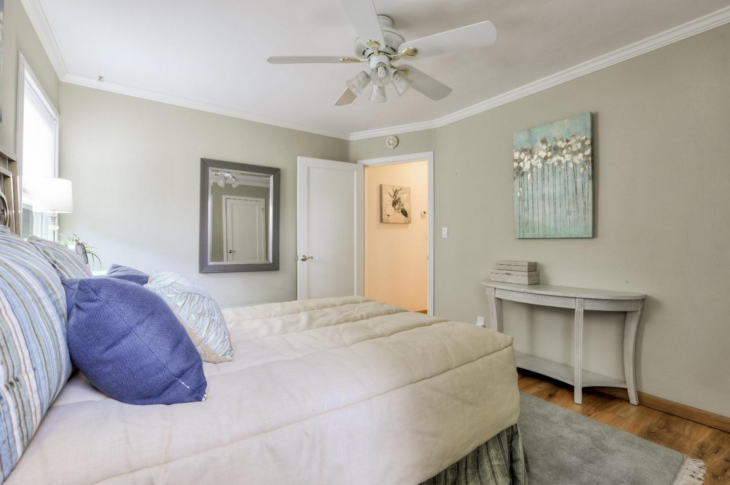 66 Church Street Mountain View, CA 94041 - Photo 21 of 45 a bedroom with a bed and a chandelier