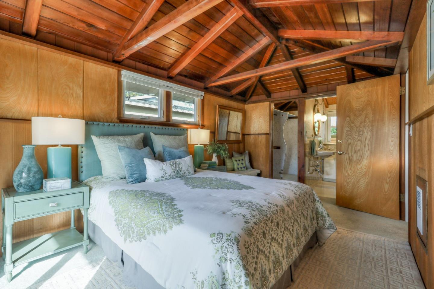 66 Church Street Mountain View, CA 94041 - Photo 24 of 45 a spacious bedroom with a bed and a walk in closet