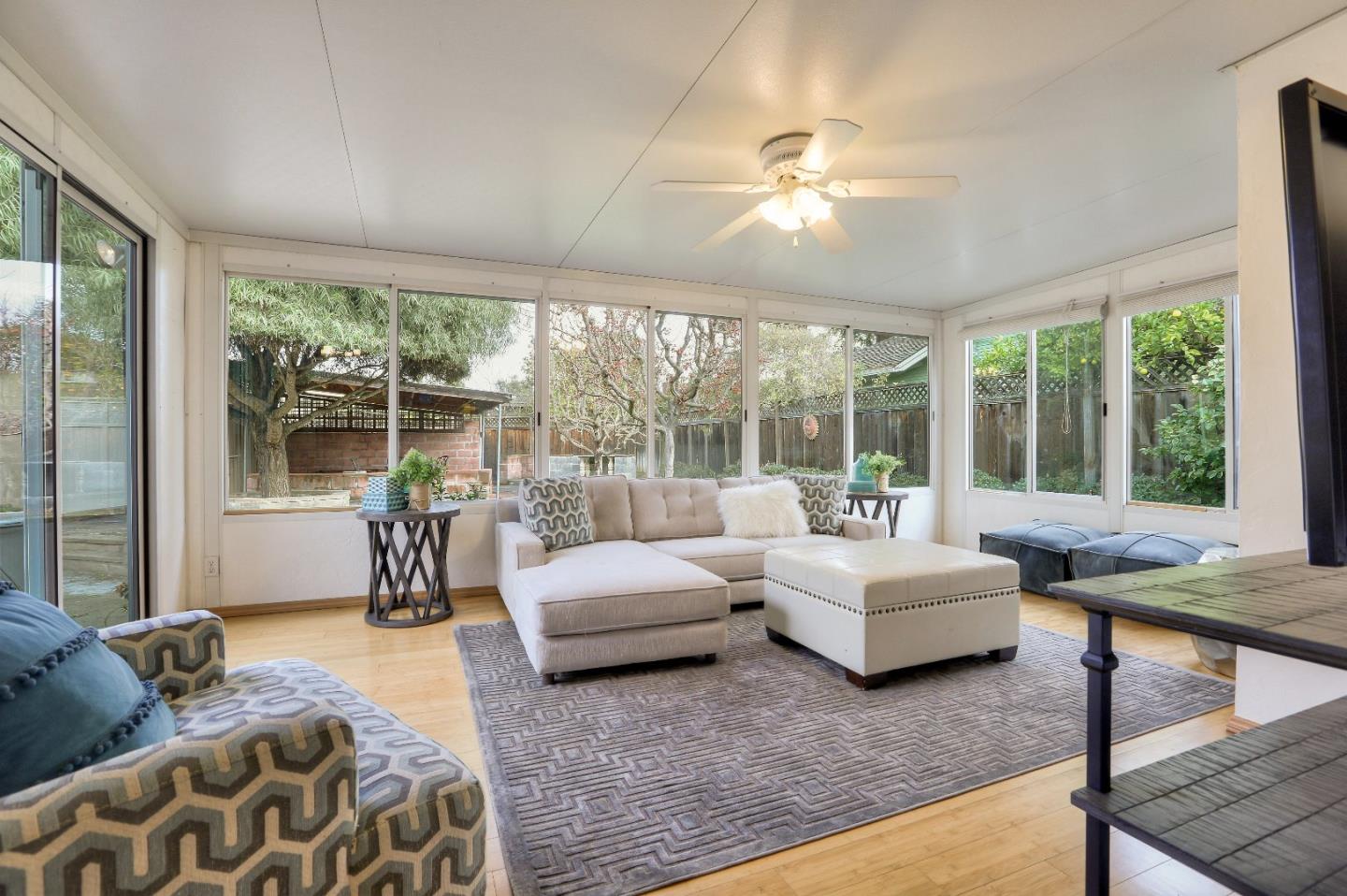 66 Church Street Mountain View, CA 94041 - Photo 32 of 45 a living room with furniture and a large window