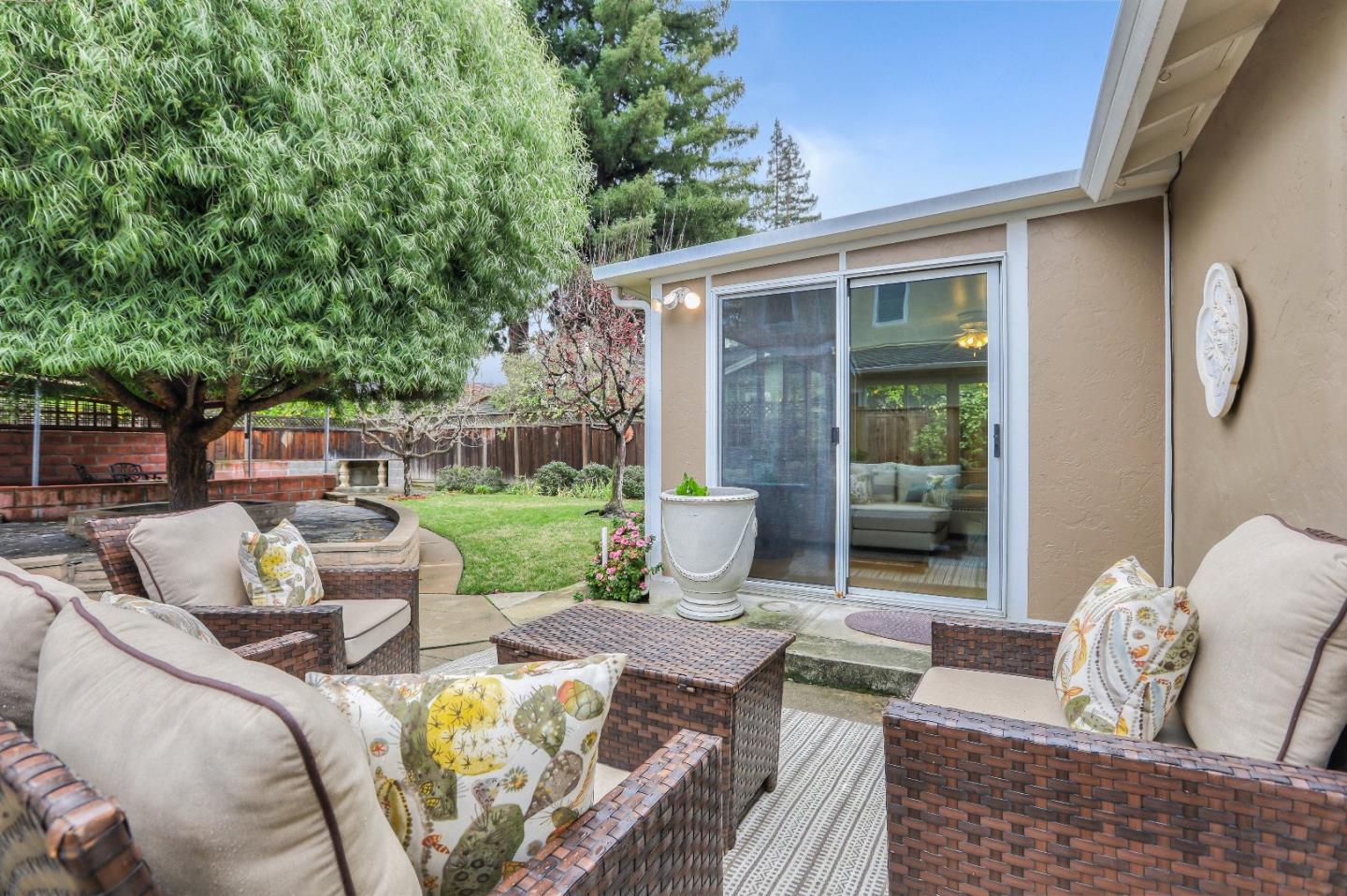 66 Church Street Mountain View, CA 94041 - Photo 34 of 45 a view of a patio with couches table and chairs and potted plants