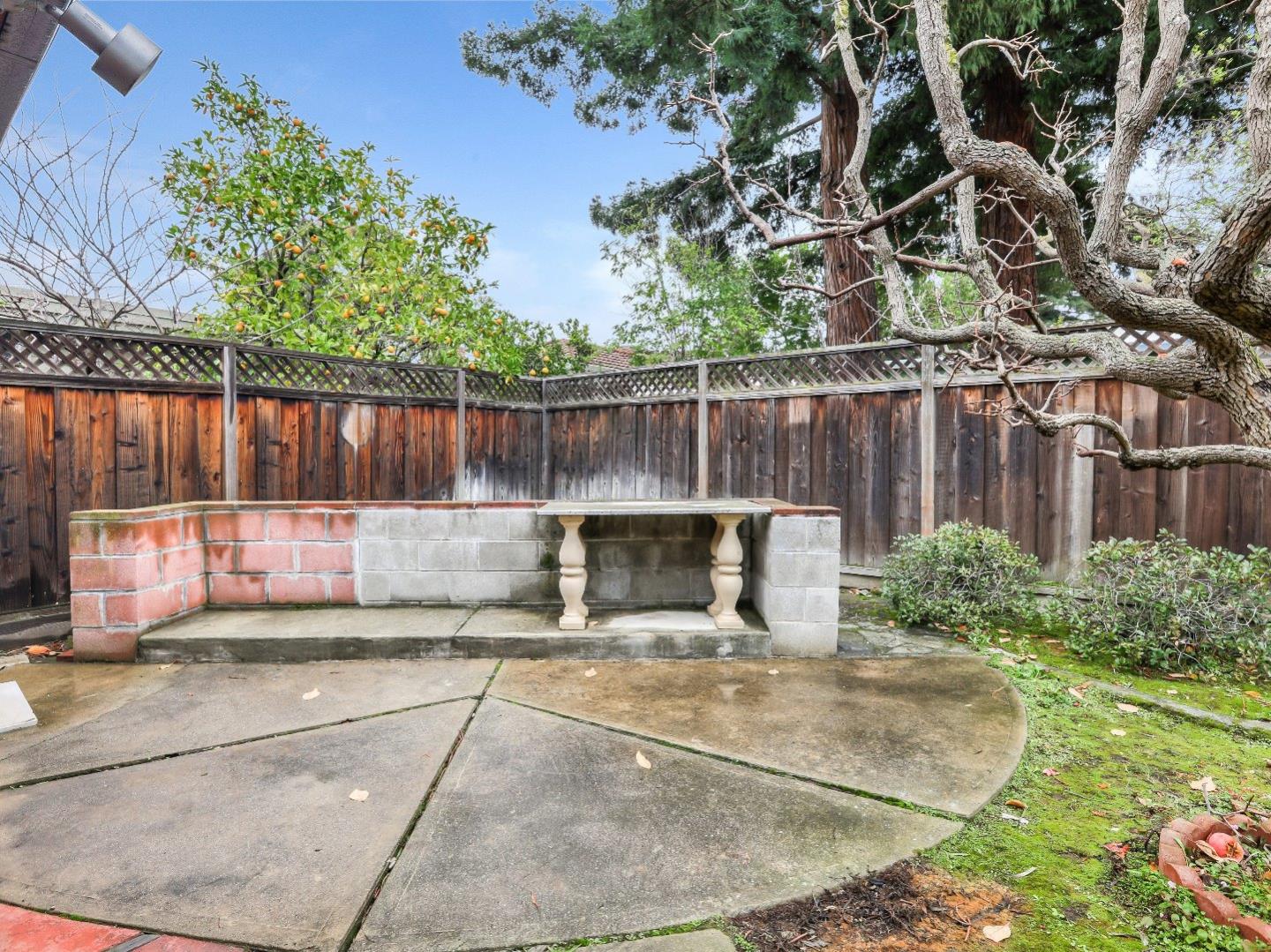 66 Church Street Mountain View, CA 94041 - Photo 43 of 45 a view of a backyard with a small cabin and a chair