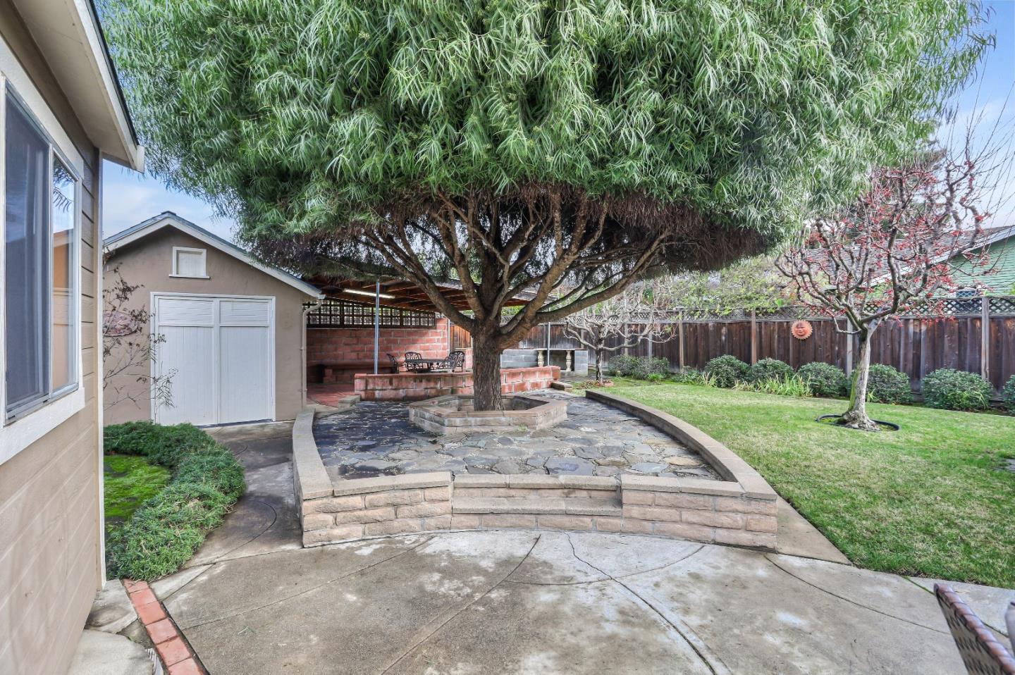 66 Church Street Mountain View, CA 94041 - Photo 44 of 45 a view of a yard with plants and trees