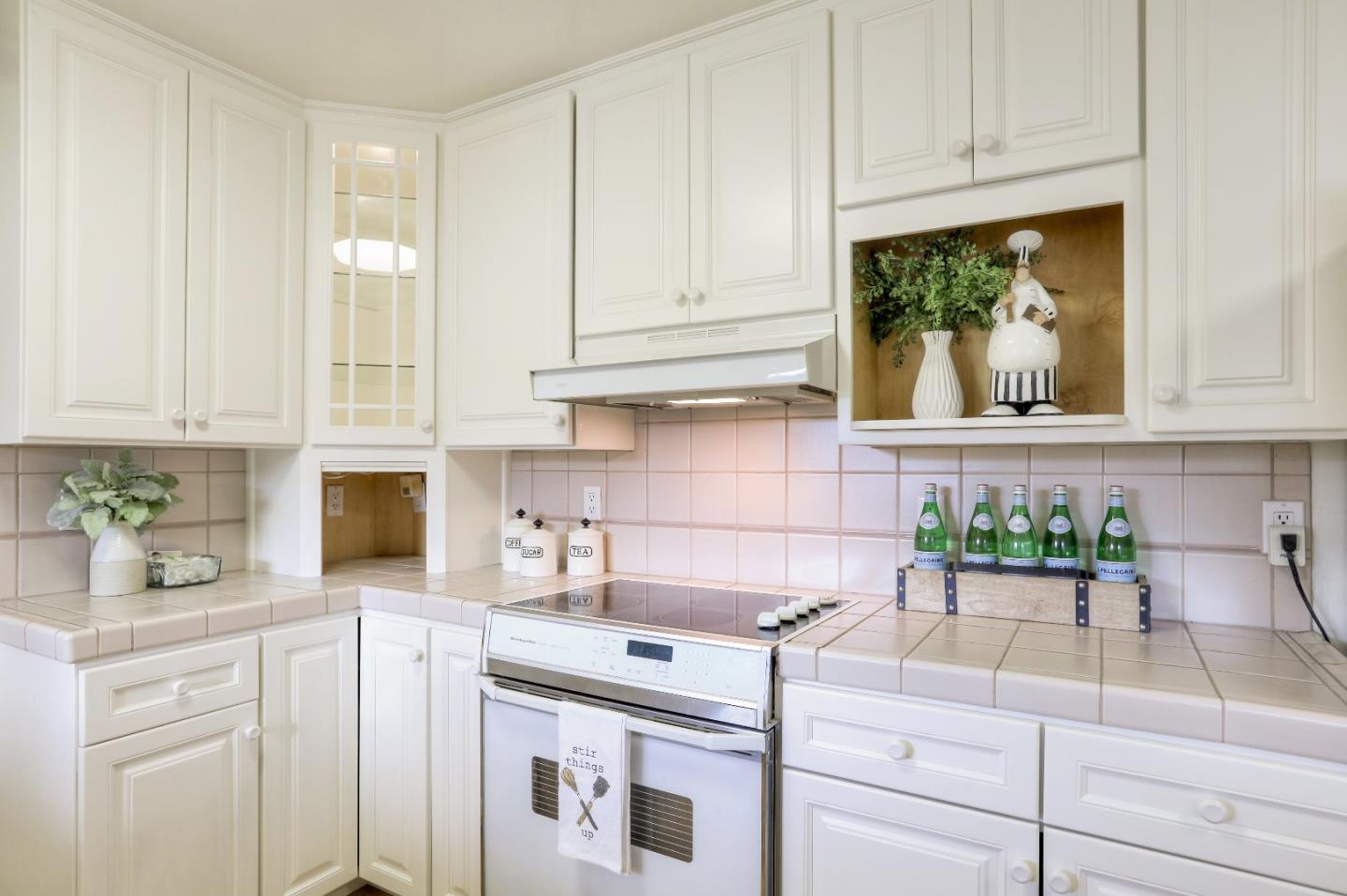 66 Church Street Mountain View, CA 94041 - Photo 10 of 45 a kitchen with stainless steel appliances white cabinets and a stove