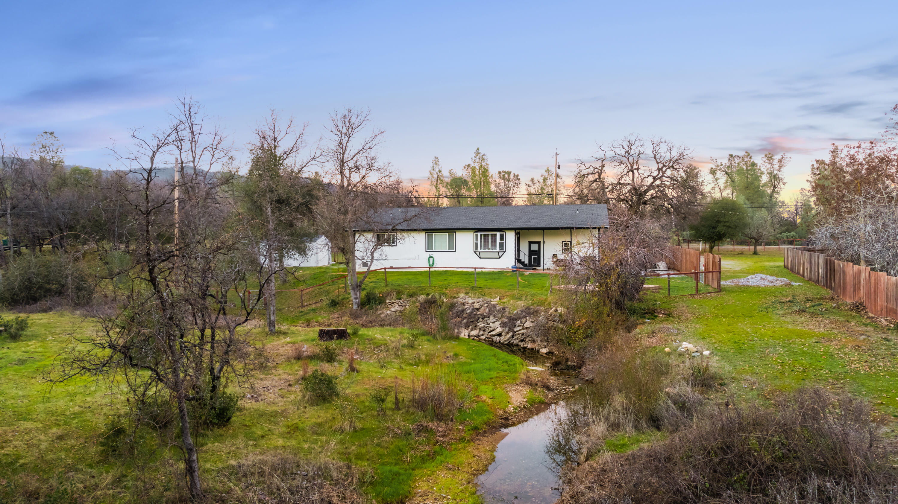 8113 Placer Road Redding, CA 96001 - Photo 28 of 41 Drone Back w/ Seasonal Creek