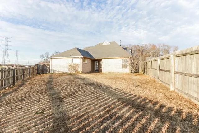 a bathroom with a bathtub shower sink vanity and a toilet