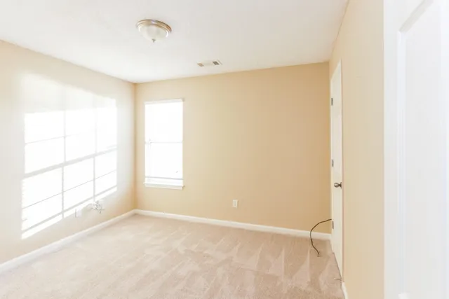 a bathroom with a bathtub a sink and a mirror