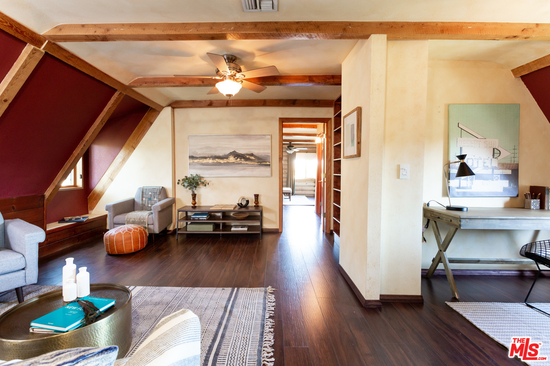 7429 Studio Road West Hills, CA 91304 - Photo 23 of 44 a view of a living room and hardwood floor
