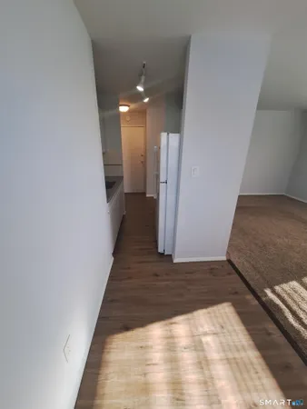 a view of hallway with stairs