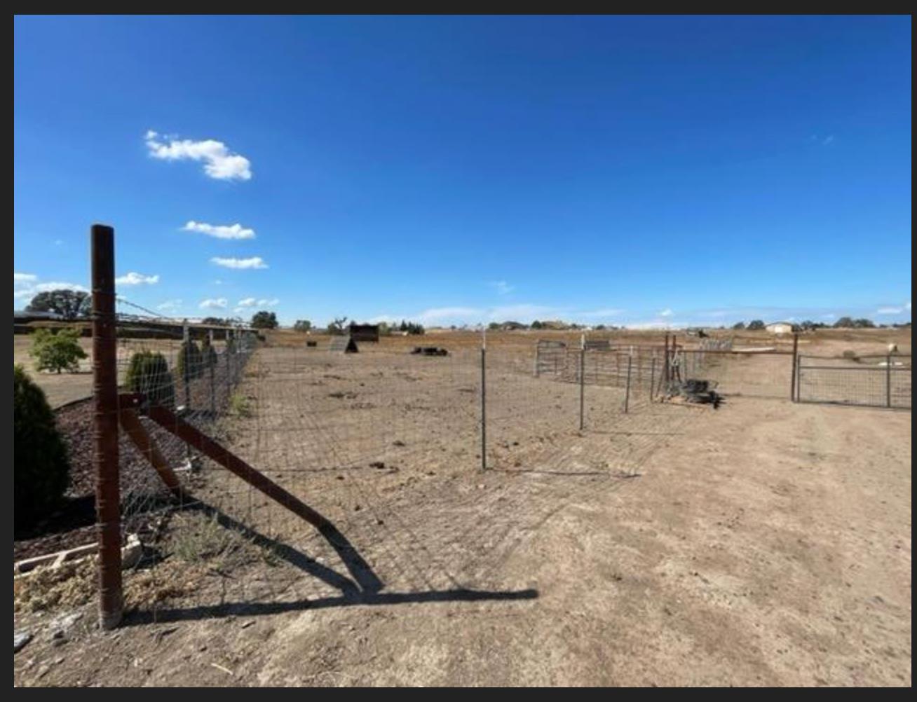 1551 Goose Creek Road Ione, CA 95640 - Photo 11 of 12 a view of a dry yard with an outdoor space