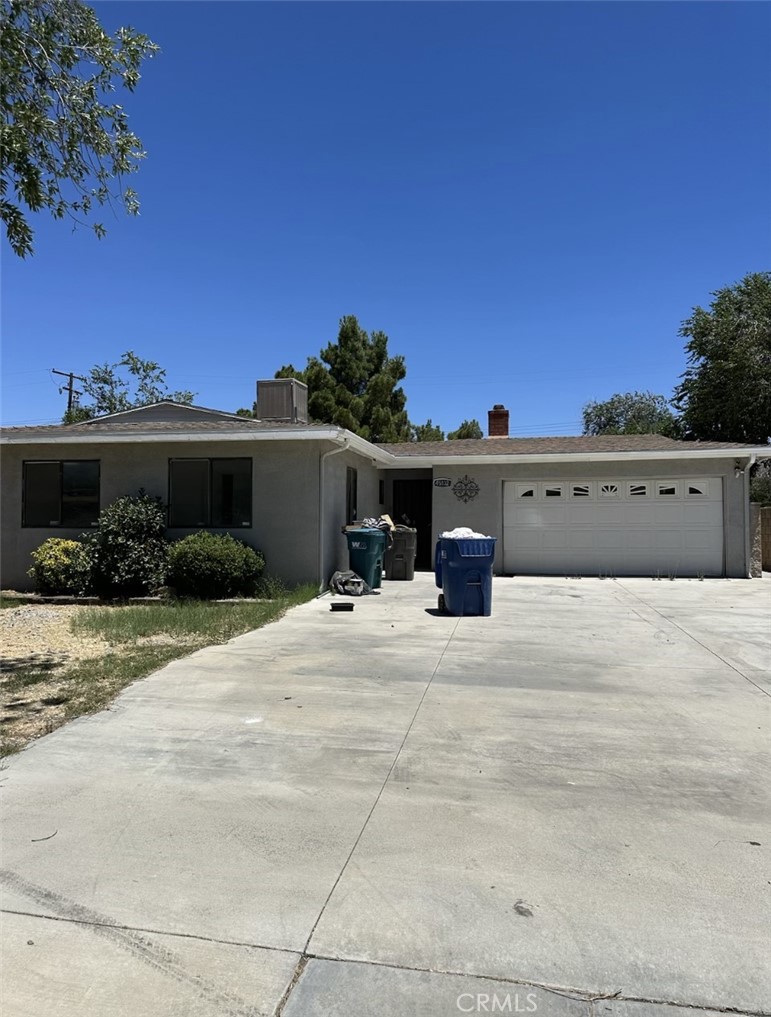 45132 Harlas Avenue Lancaster, CA 93534 - Photo 1 of 1 a view of a house with a yard