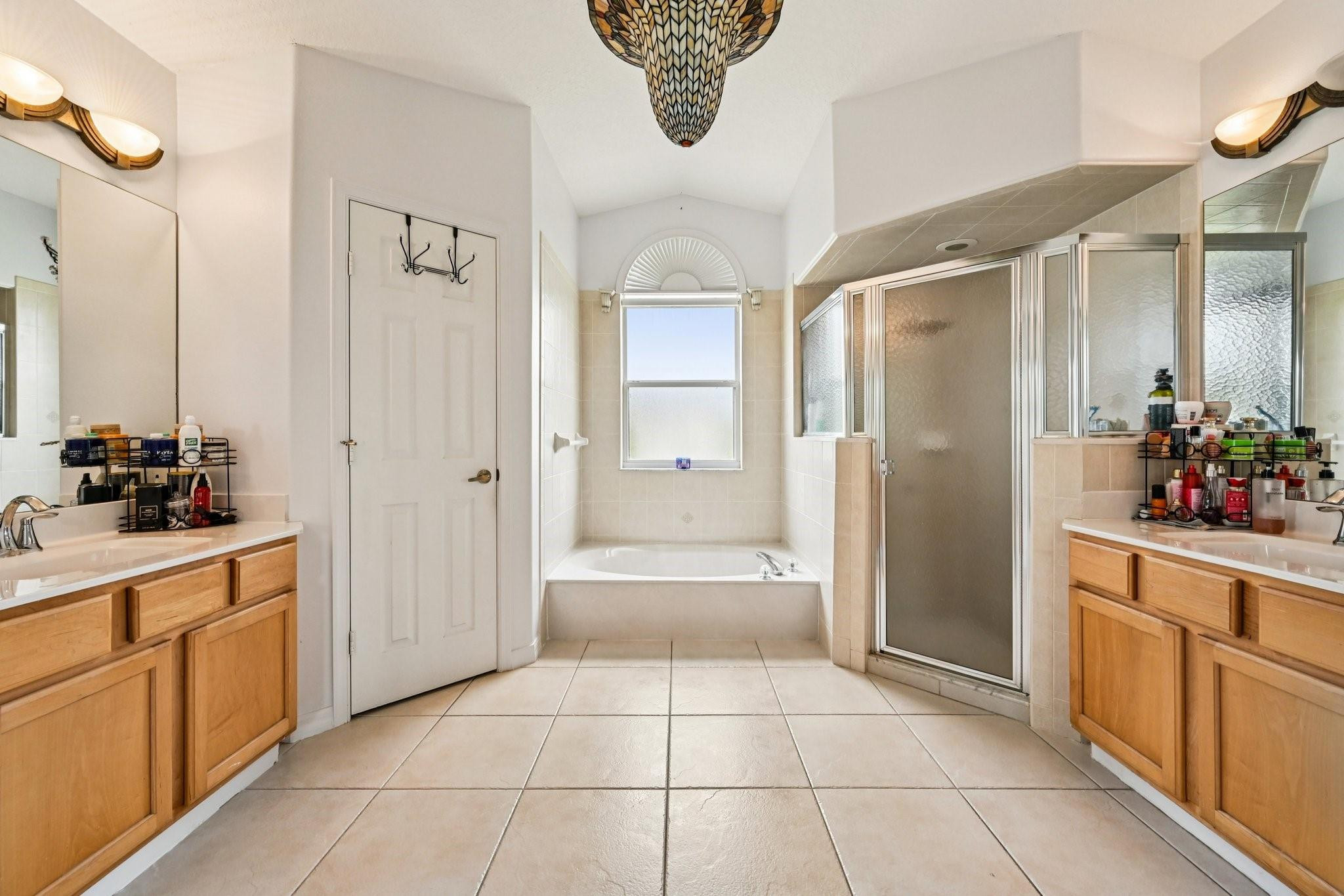 2041 Southwest Villanova Road Port St. Lucie, FL 34953 - Photo 20 of 45 a bathroom with a shower and a sink