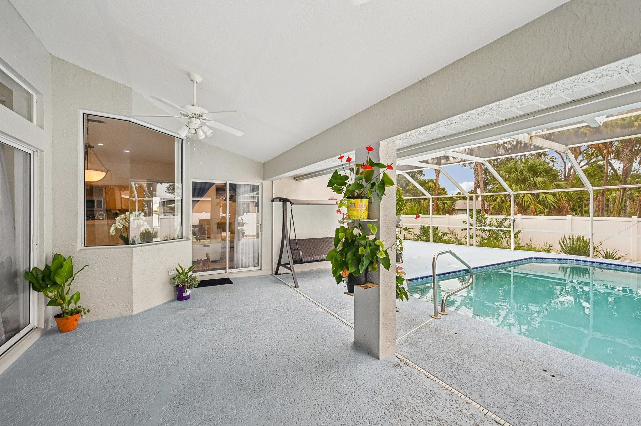 2041 Southwest Villanova Road Port St. Lucie, FL 34953 - Photo 31 of 45 a lobby with furniture and potted plant