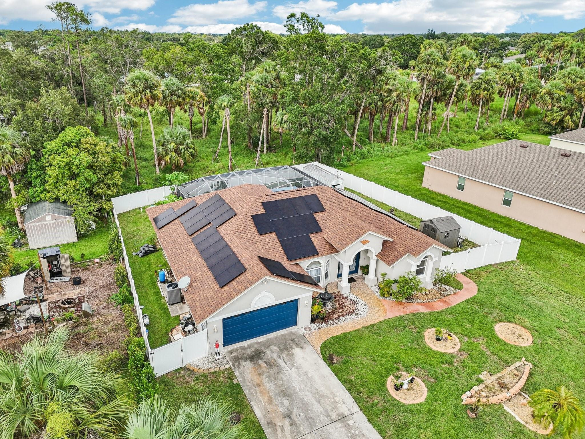 2041 Southwest Villanova Road Port St. Lucie, FL 34953 - Photo 36 of 45 an aerial view of a house with garden