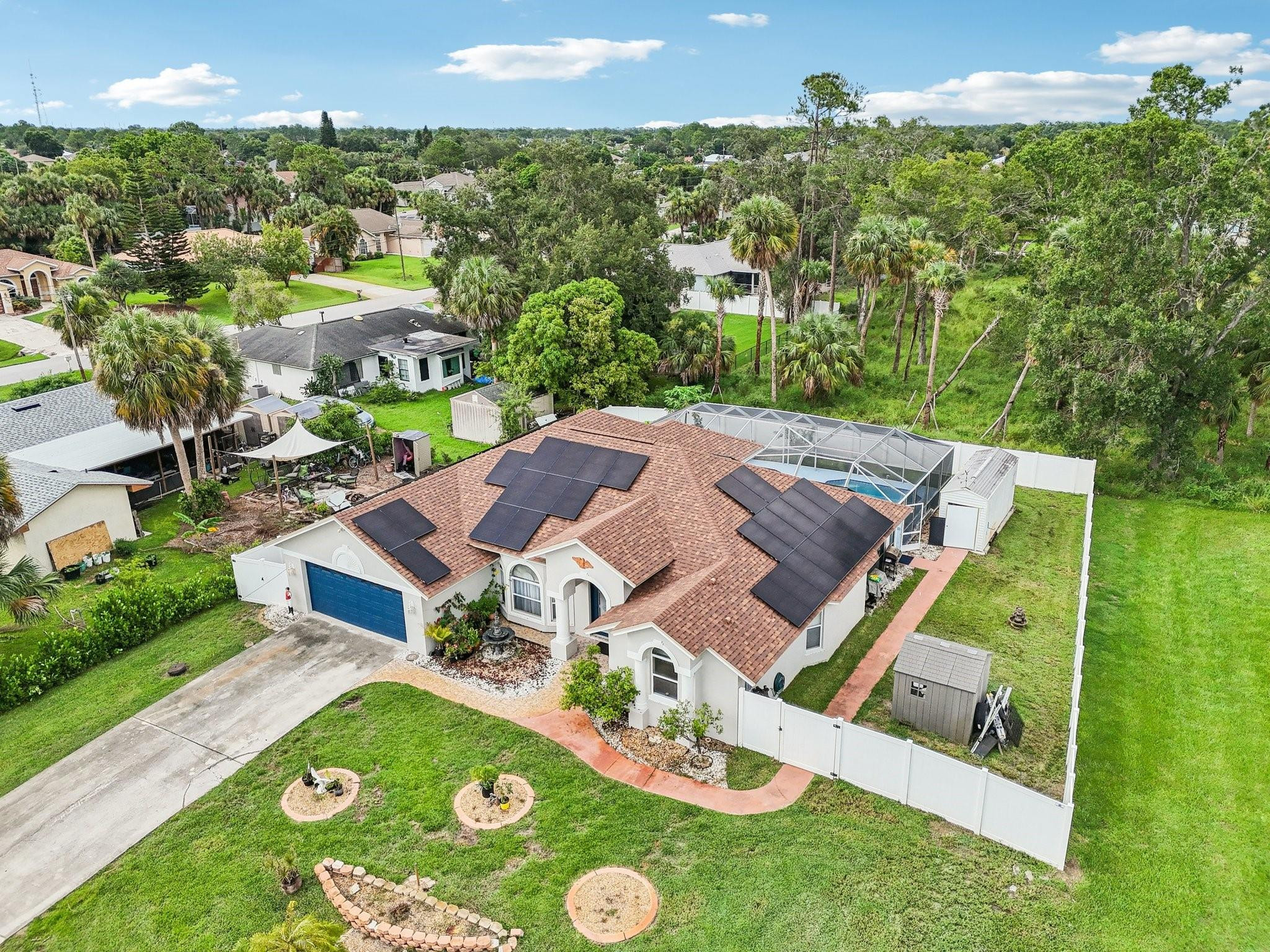 2041 Southwest Villanova Road Port St. Lucie, FL 34953 - Photo 38 of 45 an aerial view of a house with garden space and street view