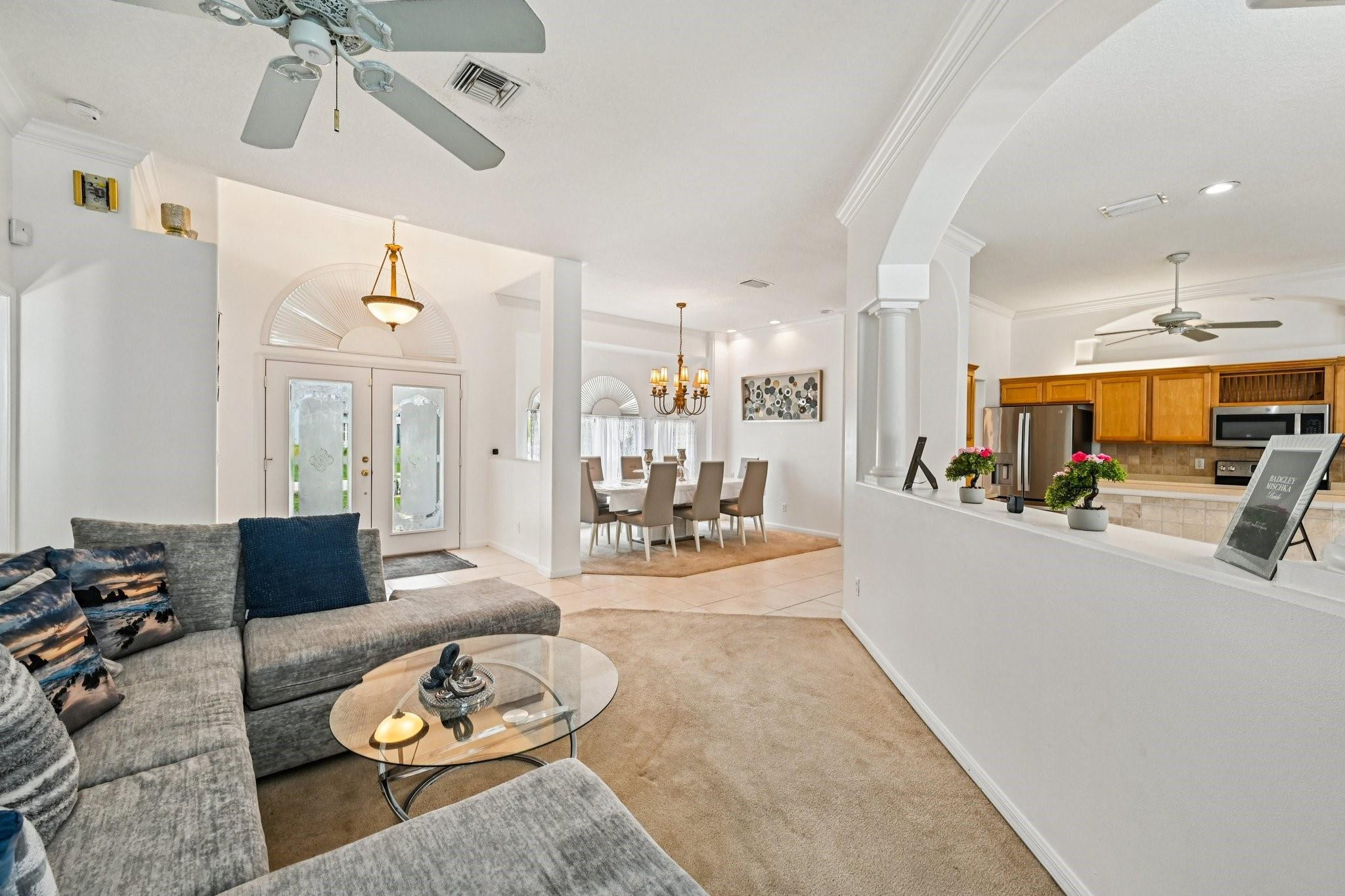 2041 Southwest Villanova Road Port St. Lucie, FL 34953 - Photo 8 of 45 a living room with furniture and a dining table