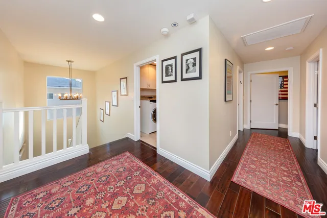 a view of a hallway with front door