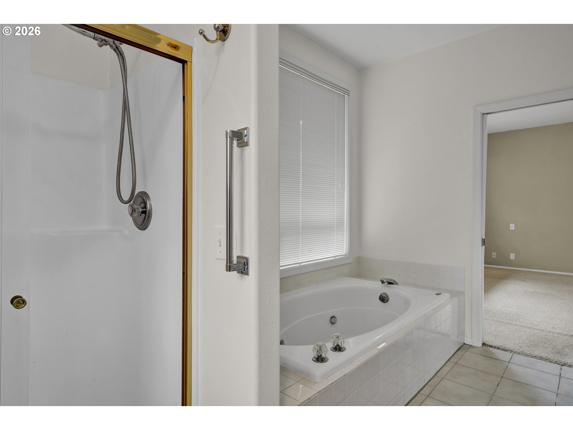 223 Beringer Court Eugene, OR 97404 - Photo 26 of 48 a bathroom with a bath tub and a shower