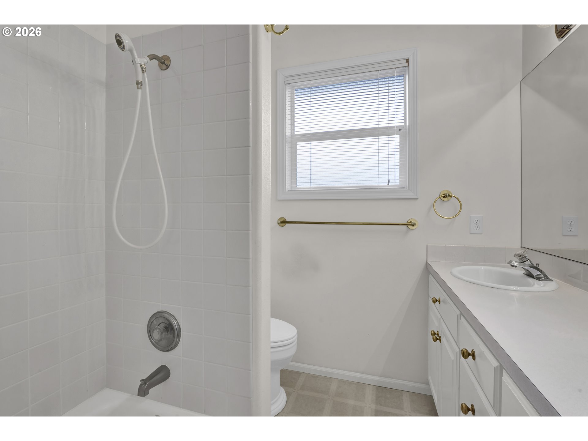 223 Beringer Court Eugene, OR 97404 - Photo 29 of 48 a bathroom with a granite countertop sink a mirror and a shower