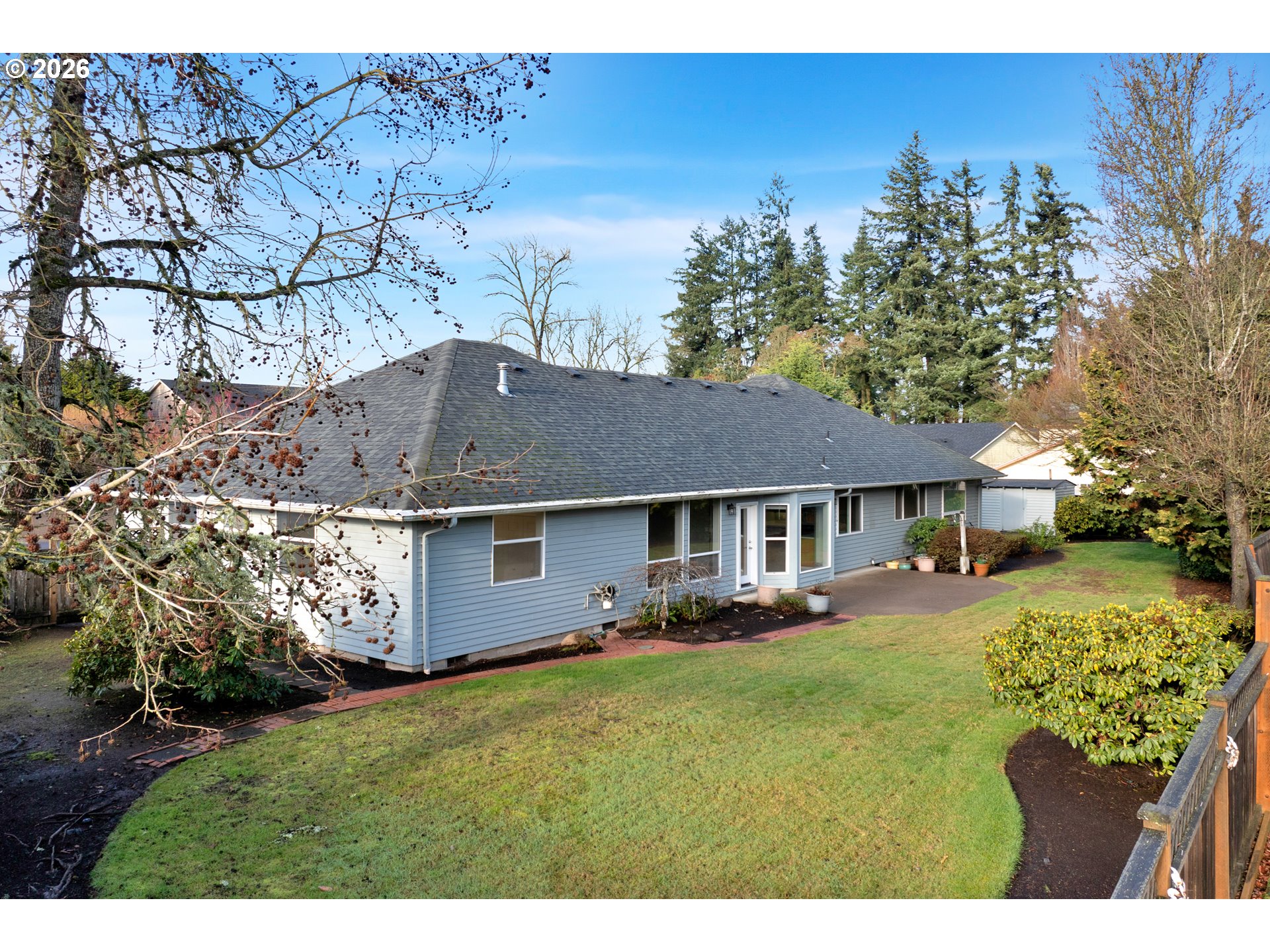 223 Beringer Court Eugene, OR 97404 - Photo 33 of 48 a front view of a house with a garden