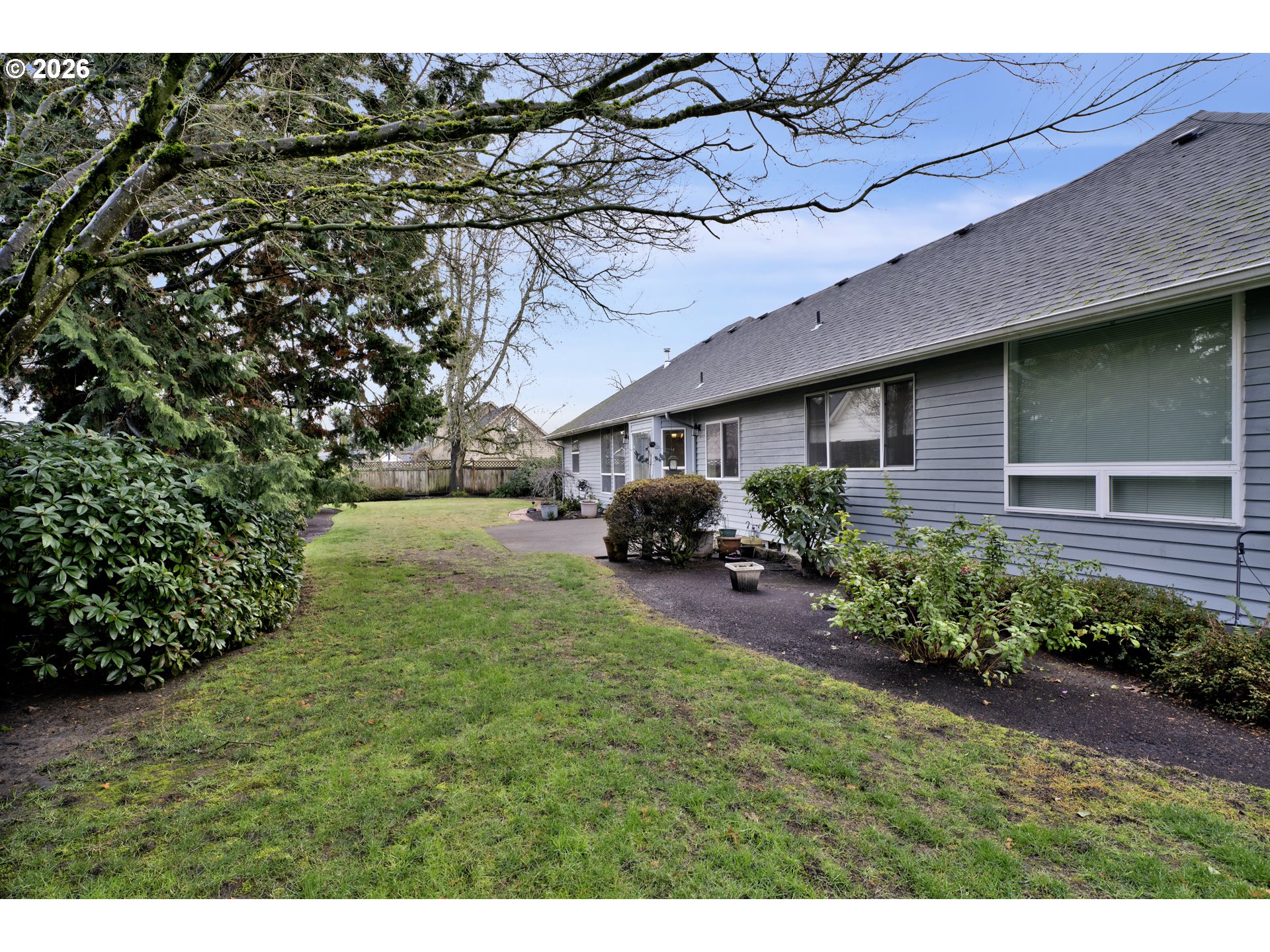 223 Beringer Court Eugene, OR 97404 - Photo 35 of 48 a front view of a house with garden