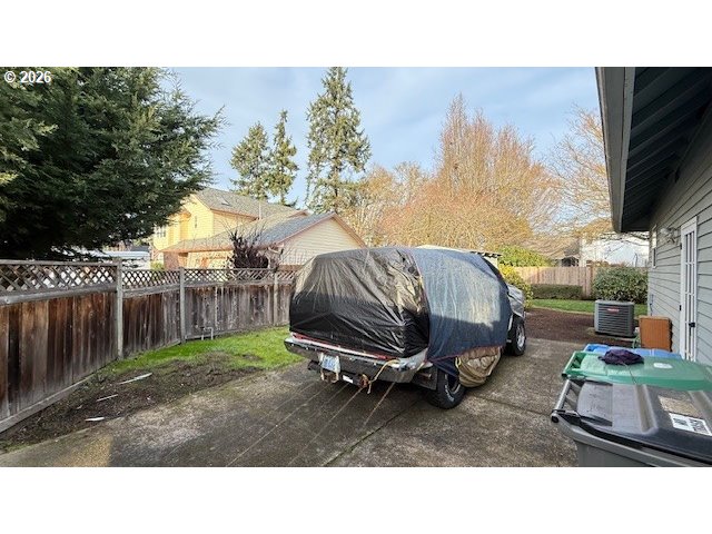 223 Beringer Court Eugene, OR 97404 - Photo 42 of 48 a backyard of a house with barbeque oven table and chairs