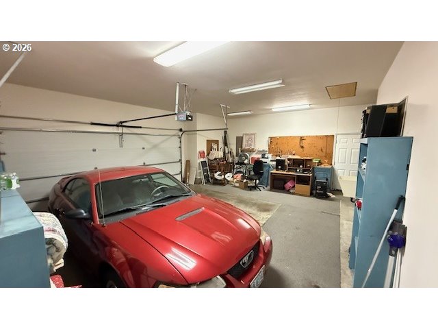 223 Beringer Court Eugene, OR 97404 - Photo 43 of 48 a living room with furniture and a flat screen tv