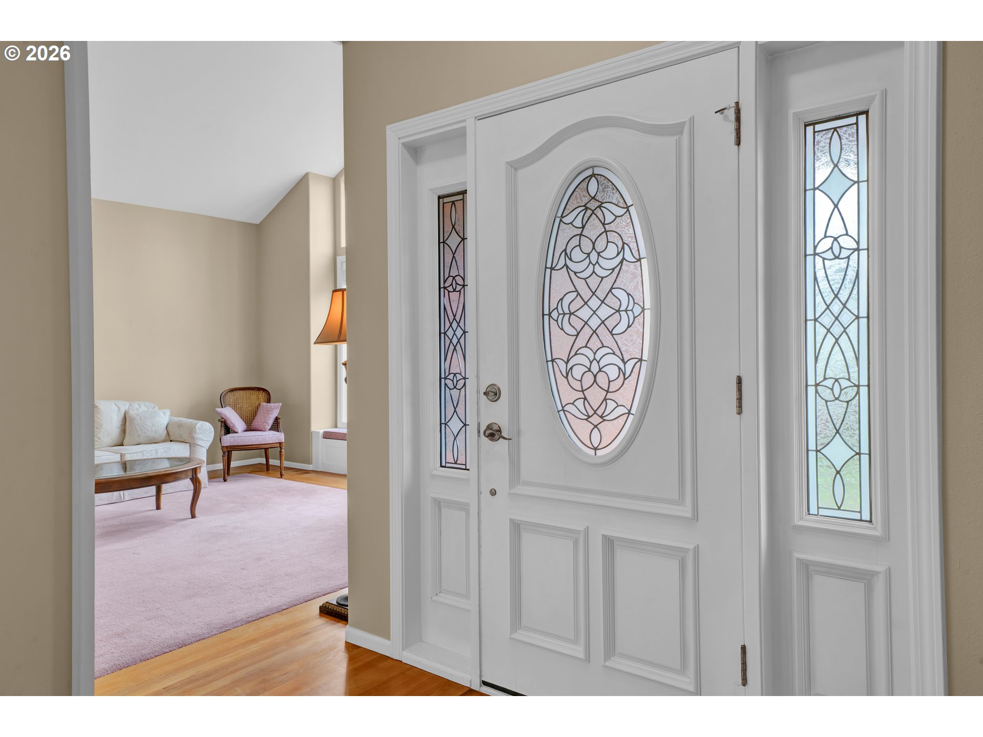 223 Beringer Court Eugene, OR 97404 - Photo 5 of 48 a view of a hallway to a livingroom and a dinning area with furniture
