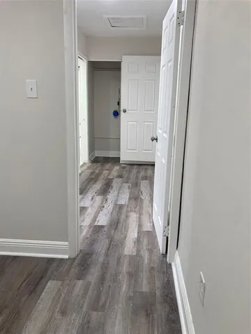 a utility room with cabinets washer and dryer