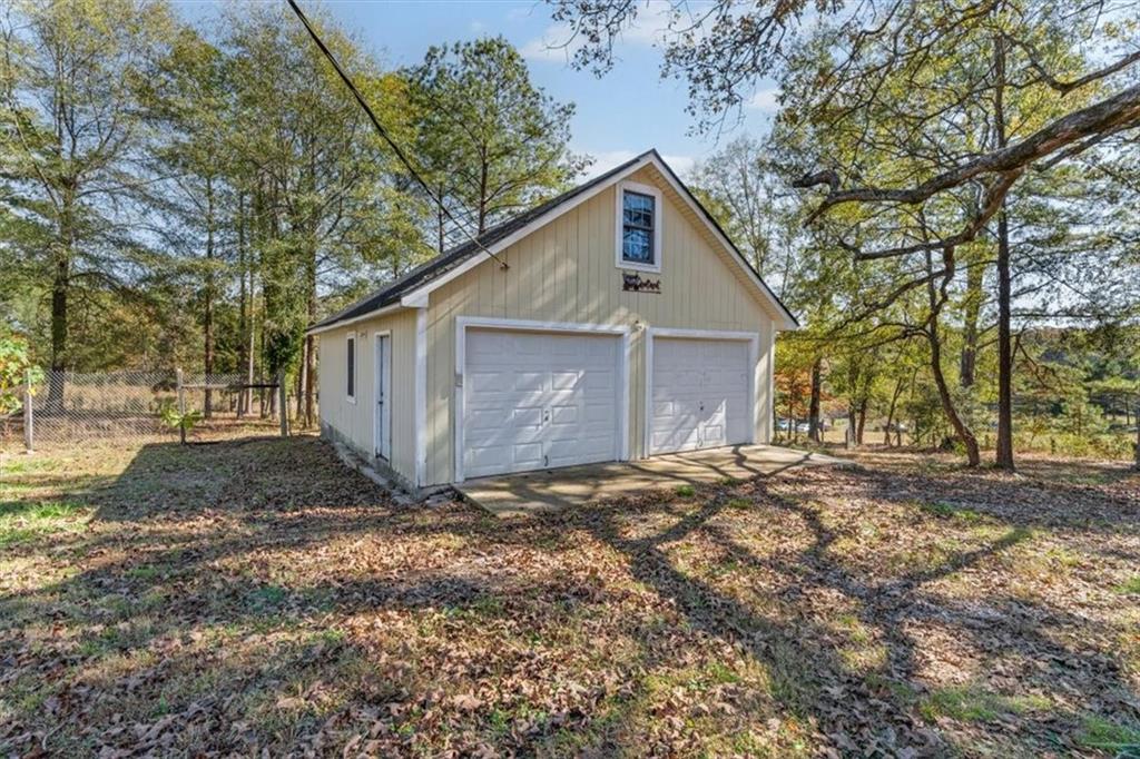 110 A Williams Road Southeast Silver Creek, GA 30173 - Photo 40 of 61 a view of a house with a yard covered in snow