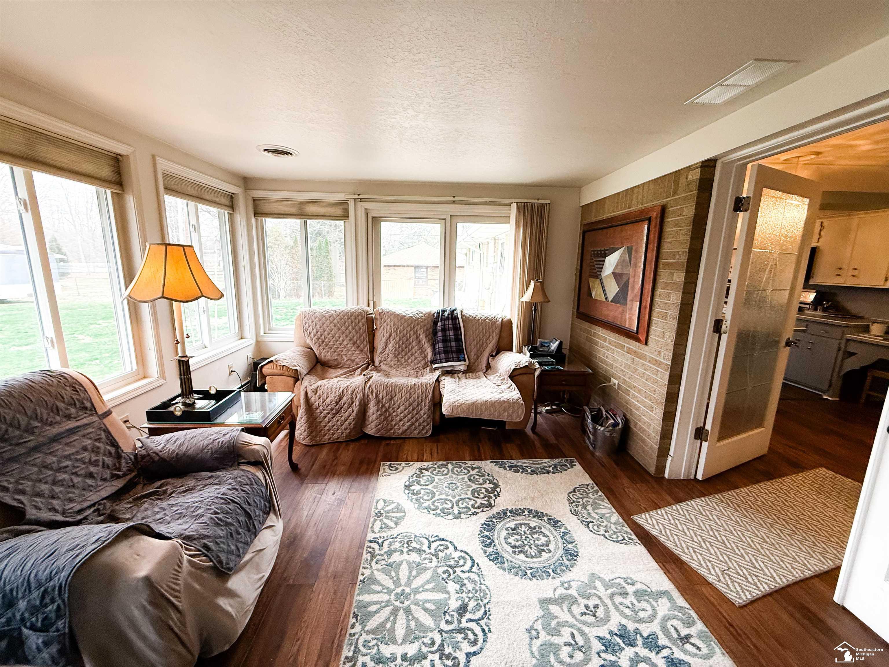 4230 St Anthony Road Temperance, MI 48182 - Photo 19 of 32 Sunroom with view of dining room
