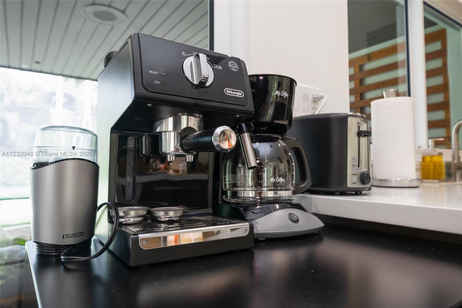 7544 Southwest 78th Terrace Miami, FL 33143 - Photo 11 of 60 a view of living room with furniture and kitchen view