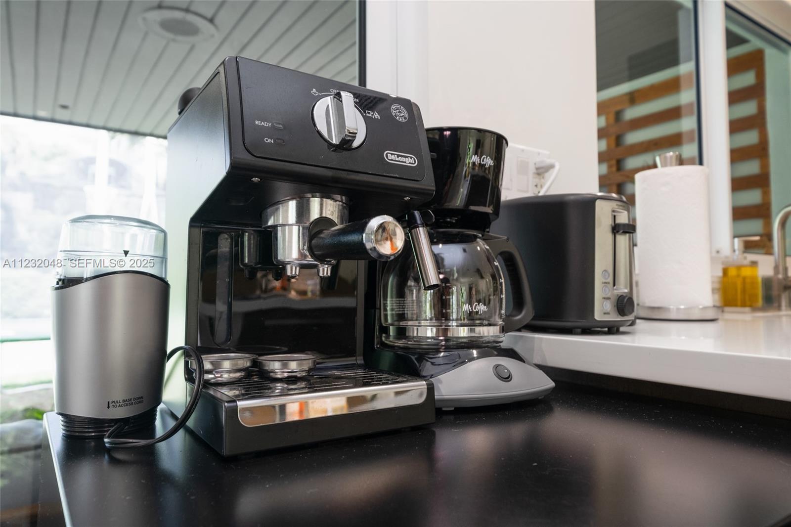 7544 Southwest 78th Terrace Miami, FL 33143 - Photo 11 of 60 a view of living room with furniture and a fireplace