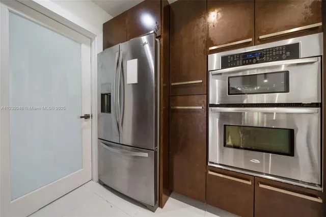 a view of a living room and dining room