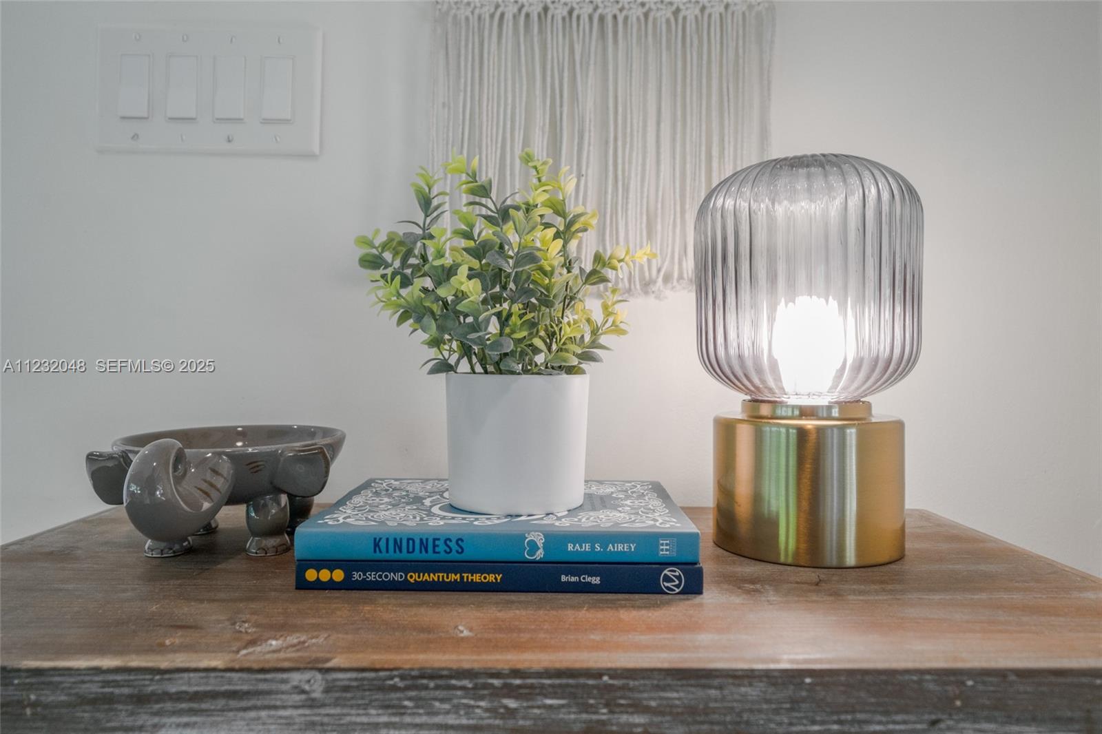 7544 Southwest 78th Terrace Miami, FL 33143 - Photo 22 of 60 a living room with furniture and a chandelier