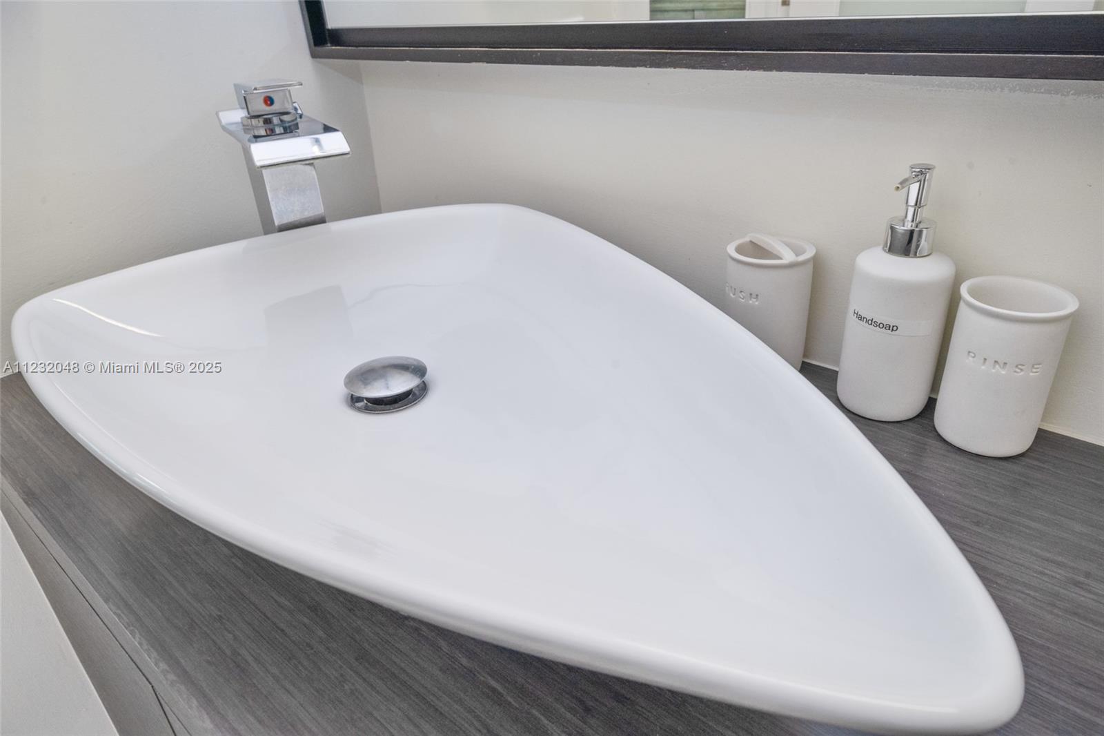 7544 Southwest 78th Terrace Miami, FL 33143 - Photo 31 of 60 a bathroom with a sink and a toilet