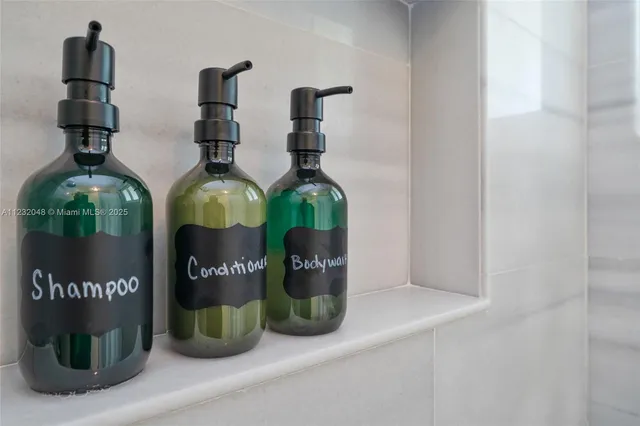 a white bath tub sitting in a bathroom