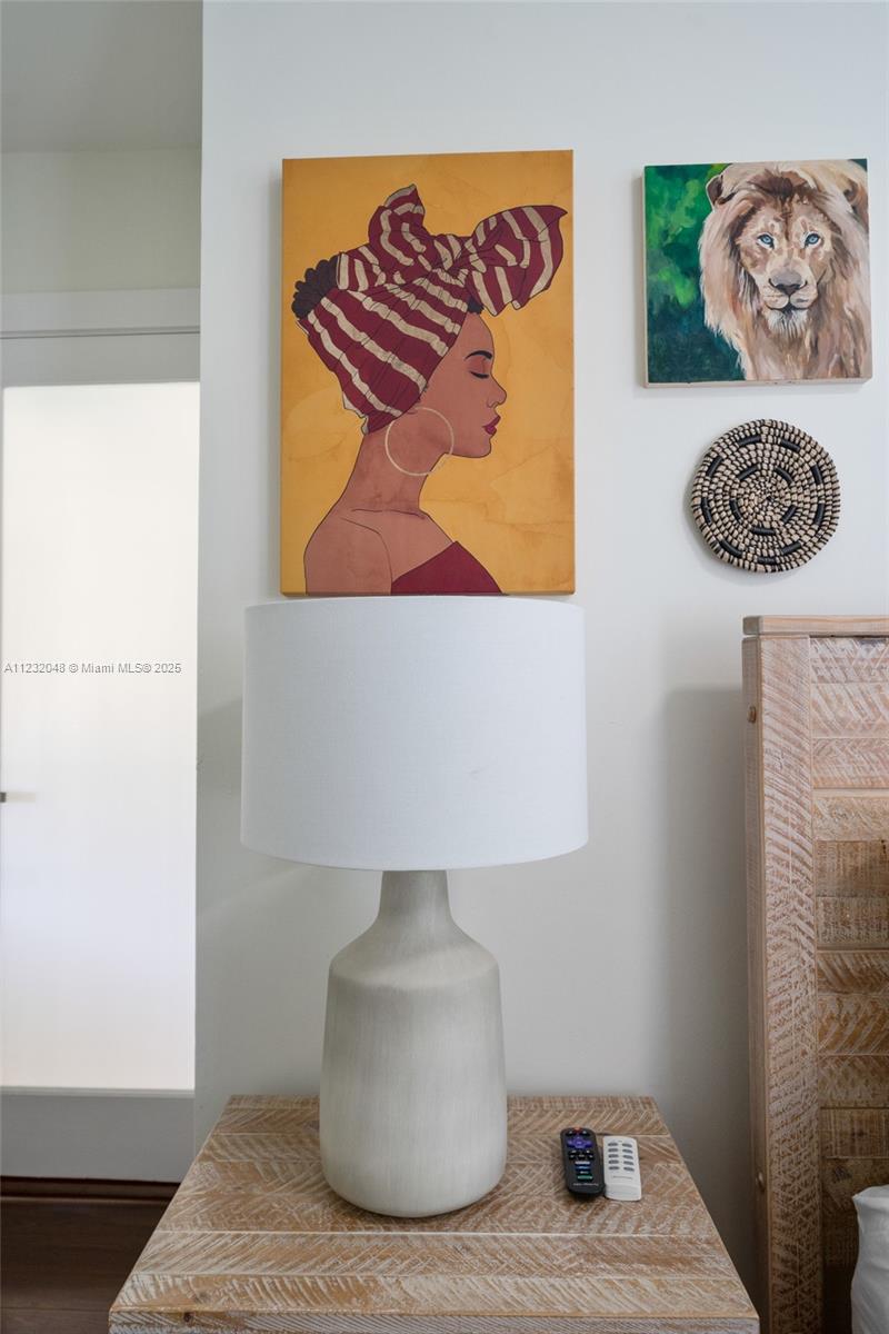 7544 Southwest 78th Terrace Miami, FL 33143 - Photo 37 of 60 a bedroom with a rug and a lamp