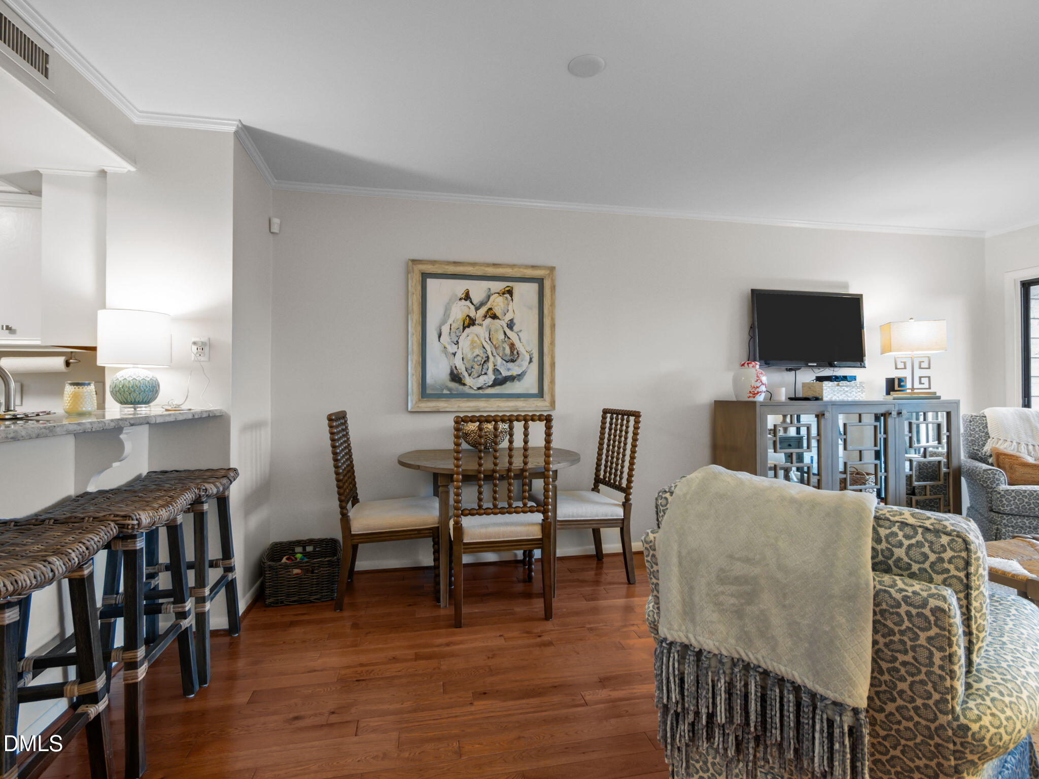 2308 West Fort Macon Road, Unit 204H Atlantic Beach, NC 28512 - Photo 16 of 83 a view of a livingroom with furniture and a flat screen tv
