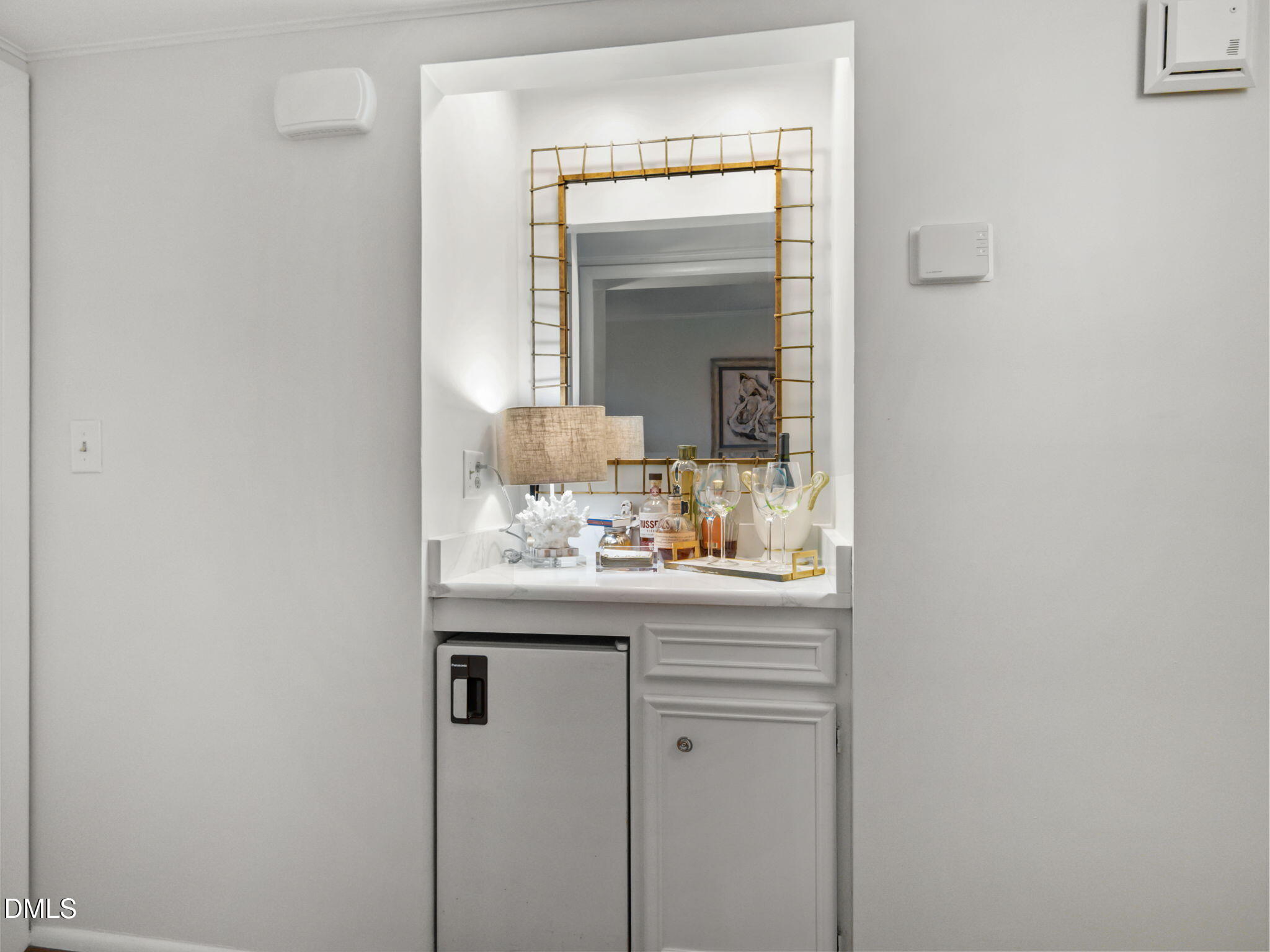 2308 West Fort Macon Road, Unit 204H Atlantic Beach, NC 28512 - Photo 17 of 83 a bathroom with a sink and a mirror