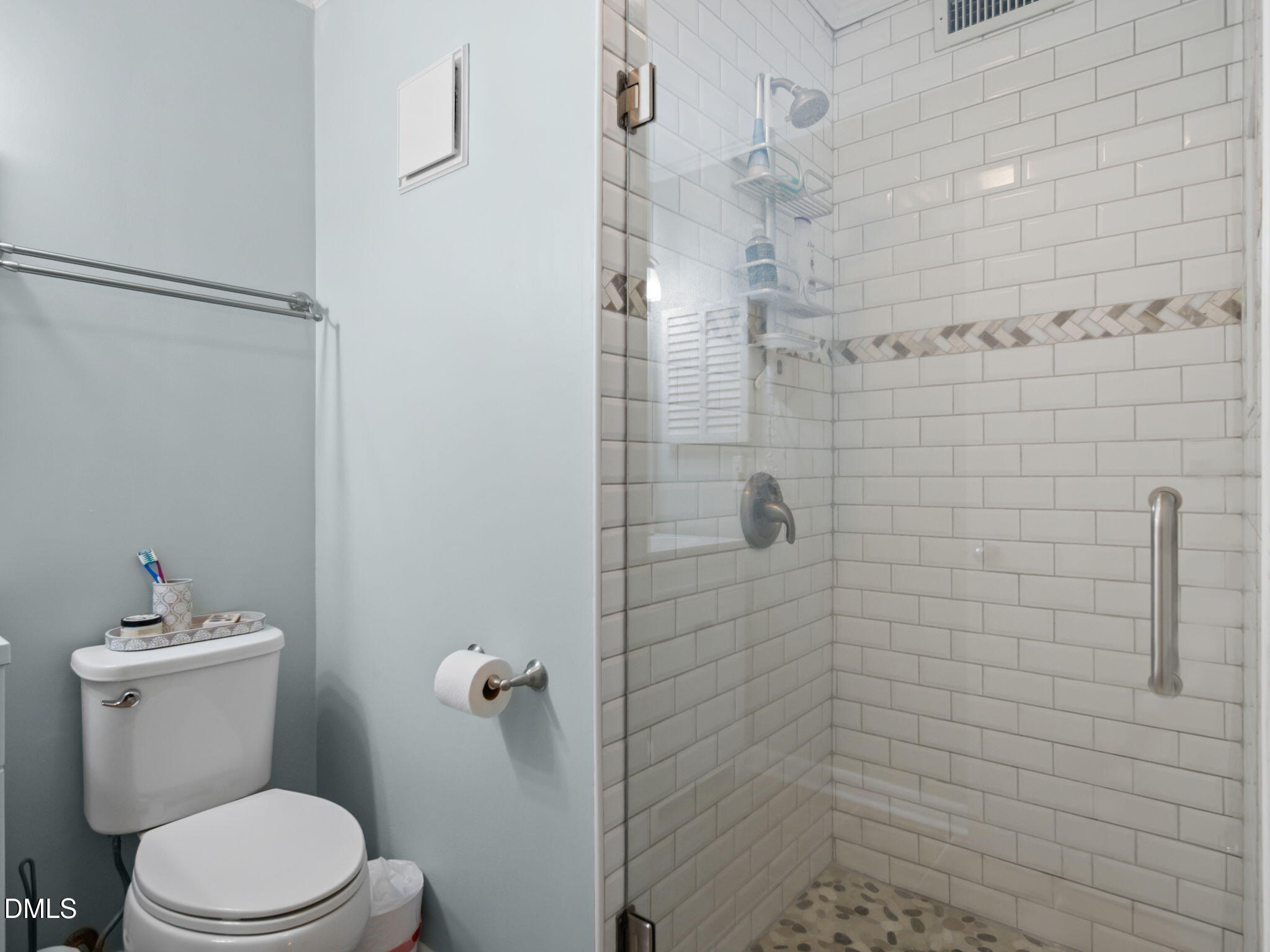 2308 West Fort Macon Road, Unit 204H Atlantic Beach, NC 28512 - Photo 25 of 83 a white toilet sitting next to a shower
