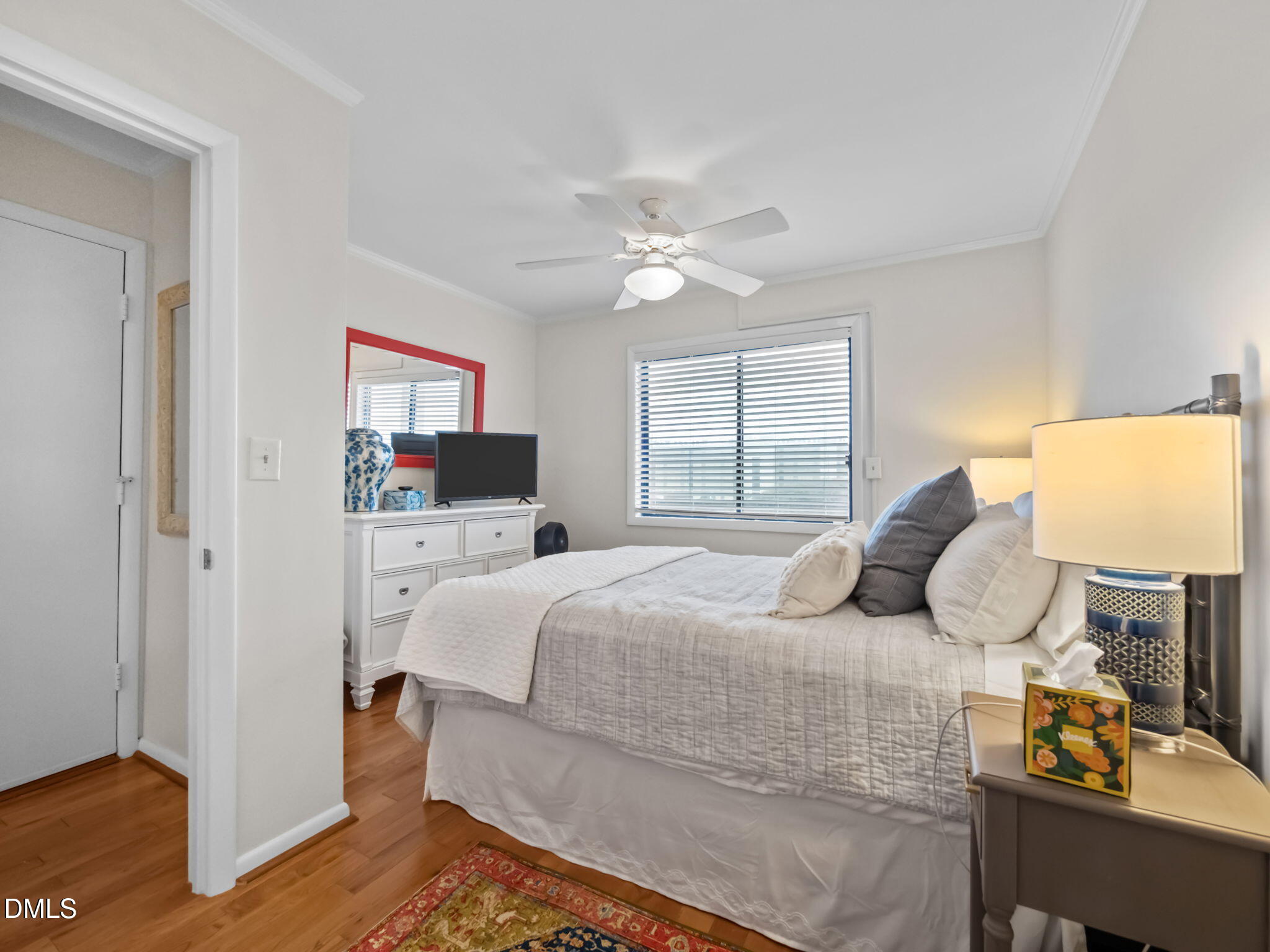 2308 West Fort Macon Road, Unit 204H Atlantic Beach, NC 28512 - Photo 37 of 83 a bedroom with a bed and a window