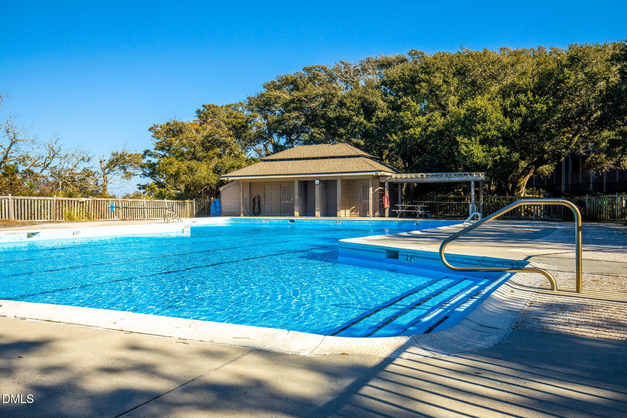 2308 West Fort Macon Road, Unit 204H Atlantic Beach, NC 28512 - Photo 56 of 83 a view of a house with pool yard and outdoor seating